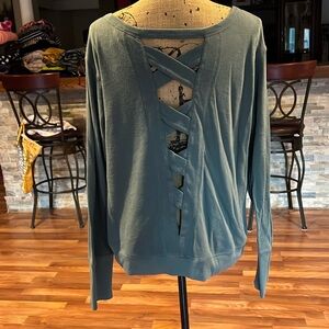 Size XL green sweatshirt with criss cross opening on back